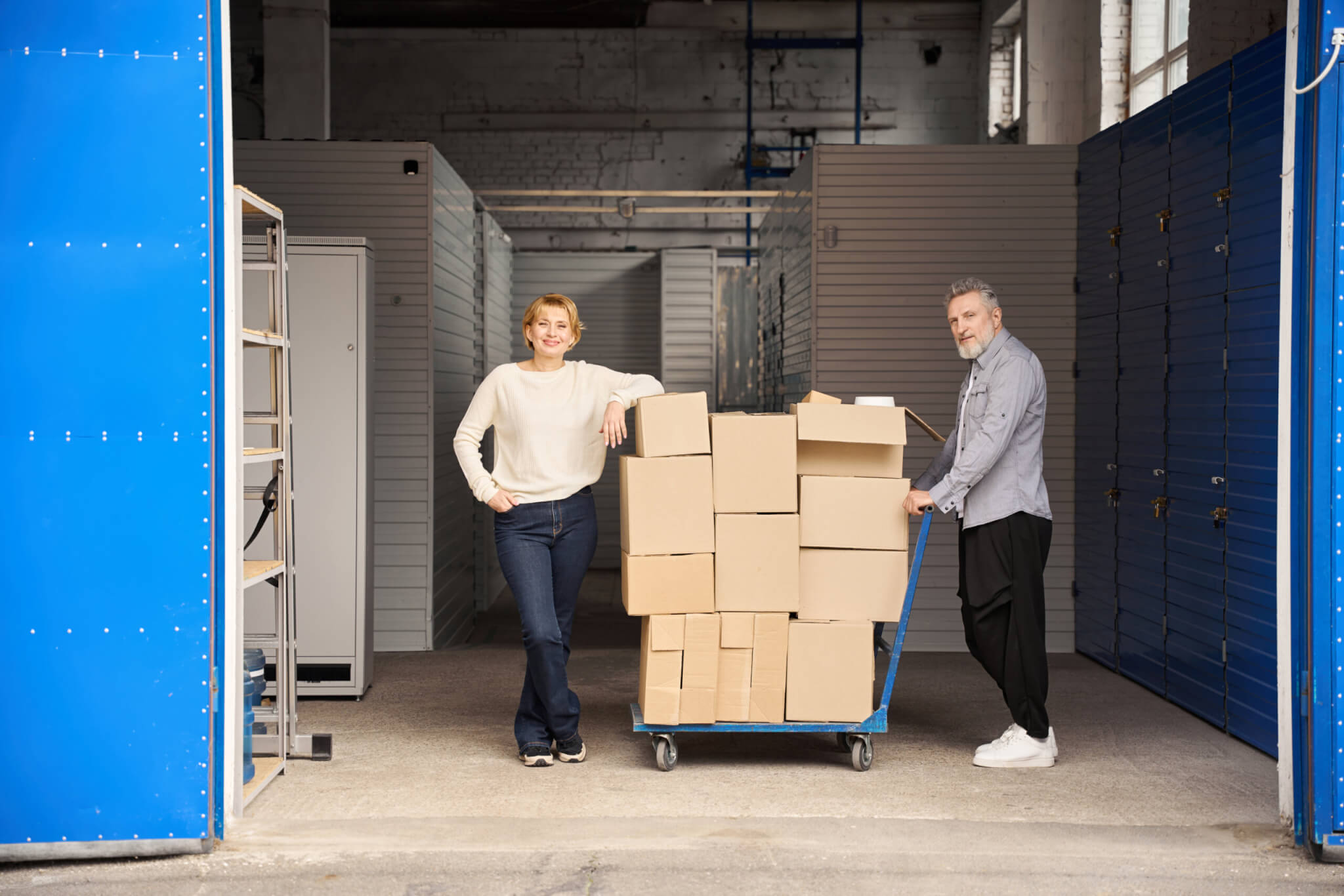 People moving items into storage